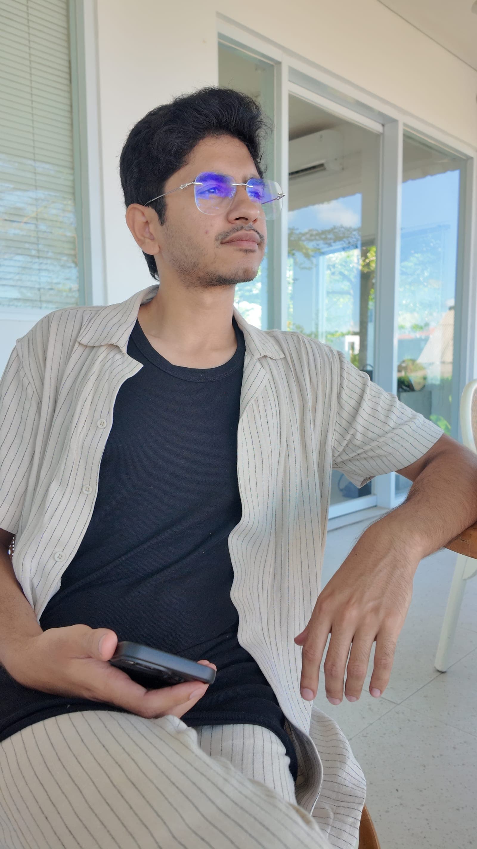 Waseem mapping a chat flow on the veranda